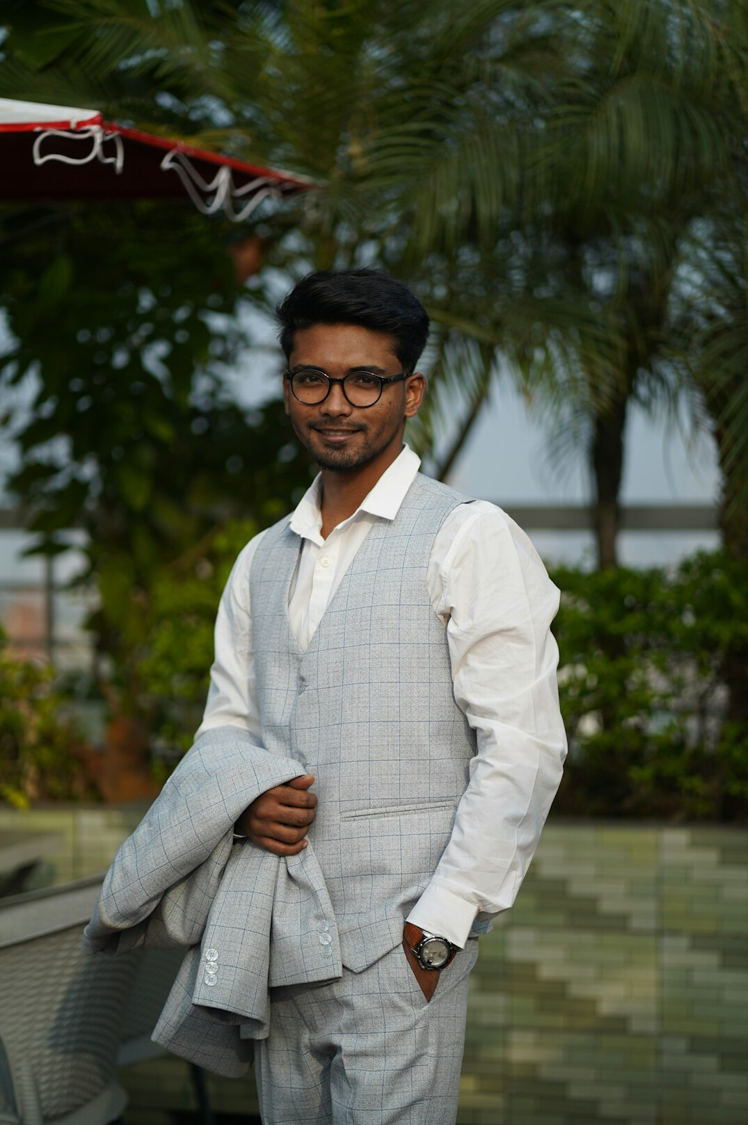 Portrait of a man in a suit with a friendly smile