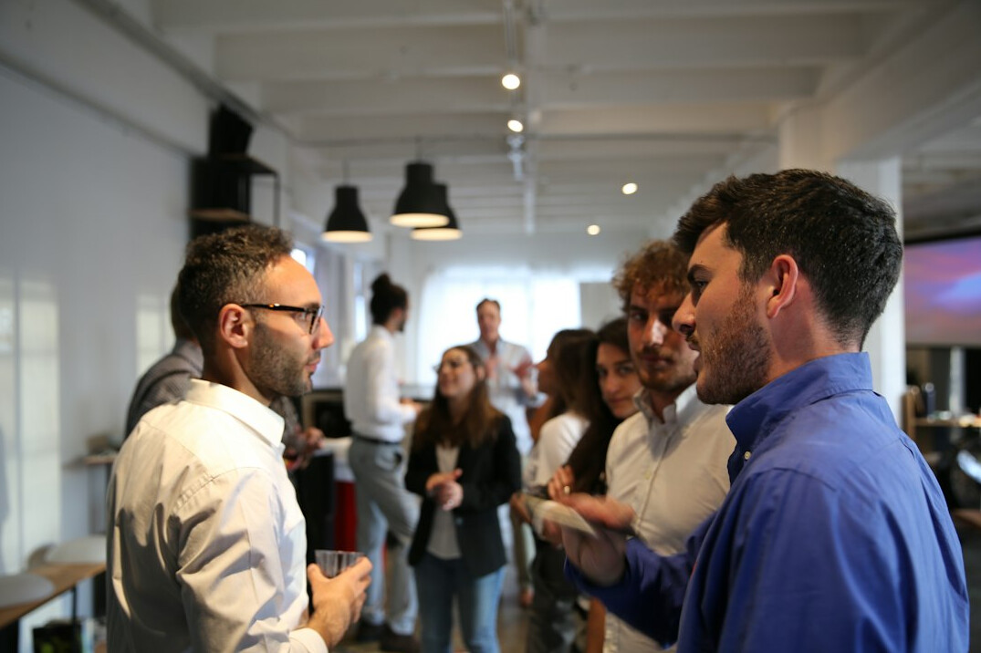 diverse group of it professionals networking