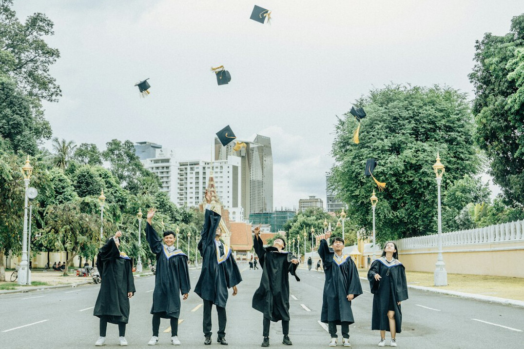 group of it graduates celebrating