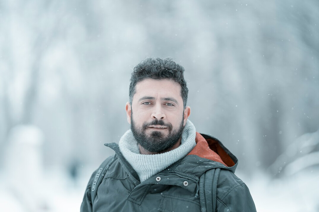 Portrait of a bearded man looking at the camera