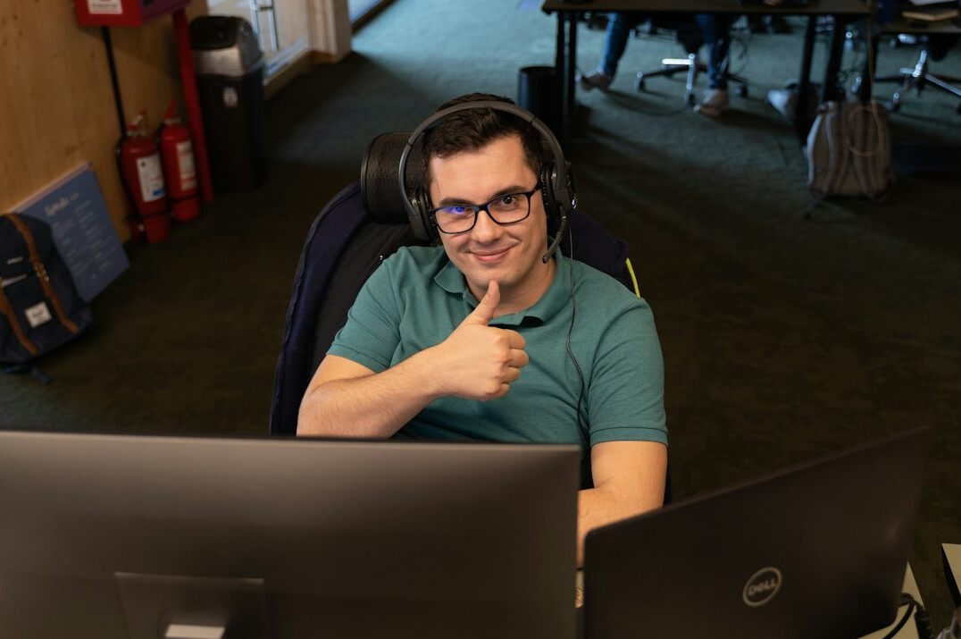 successful programmer smiling